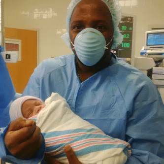 Eben with his baby boy at the hospital
